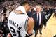 SAN ANTONIO, TX - JUNE 15: Tim Duncan #21 of the San Antonio Spurs and Pat Riley of the Miami Heat shake hands after the San Antonio Spurs victory in Game Five to win the 2014 NBA Finals between the Miami Heat and San Antonio Spurs at AT&T Center on June