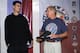 HOUSTON - DECEMBER 17: (L-R) Yao Ming of the Houston Rockets discusses Nike athletic shoes with broadcaster and former player Bill Walton before practice at the Rockets practice facility on December 17, 2002 in Houston, Texas. NOTE TO USER:User expressly