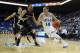 LOS ANGELES, CA - NOVEMBER 12: Zach LaVine #14 of the UCLA Bruins drives to the basket past Tommie McCune #23 of the Oakland Golden Grizzlies in the first half at Pauley Pavilion on November 12, 2013 in Los Angeles, California. (Photo by Jeff Gross/Gett