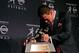 Dec 8, 2012; New York, NY, USA; Texas A&M Aggies quarterback Johnny Manziel kisses the 2012 Heisman Trophy after a press conference at the Marriott Marquis in downtown New York City. Mandatory Credit: Jerry Lai-USA TODAY Sports
