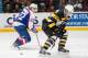 WINDSOR, ON - JANUARY 30: Roland McKeown #20 of the Kingston Frontenacs battles for the puck against Sam Povorozniouk #20 of the Windsor Spitfires on January 30, 2014 at the WFCU Centre in Windsor, Ontario, Canada. (Photo by Dennis Pajot/Getty Images)
