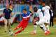 NATAL, BRAZIL - JUNE 16: Fabian Johnson of the United States controls the ball against Jonathan Mensah of Ghana during the 2014 FIFA World Cup Brazil Group G match between Ghana and the United States at Estadio das Dunas on June 16, 2014 in Natal, Brazil