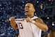 ARLINGTON, TX - APRIL 07: Shabazz Napier #13 of the Connecticut Huskies celebrates on the court after defeating the Kentucky Wildcats 60-54 in the NCAA Men's Final Four Championship at AT&T Stadium on April 7, 2014 in Arlington, Texas. (Photo by Ronald