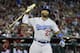 PHOENIX, AZ - MAY 18: Matt Kemp #27 of the Los Angeles Dodgers reacts after lining out for the third out with the bases loaded against the Arizona Diamondbacks during the eighth inning of a MLB game at Chase Field on May 18, 2014 in Phoenix, Arizona. (P