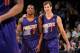 DENVER, CO - December 20: Eric Bledsoe #2 and Goran Dragic #1 of the Phoenix Suns smile and walk off the court against the Denver Nuggets on December 20, 2013 at the Pepsi Center in Denver, Colorado. NOTE TO USER: User expressly acknowledges and agrees t