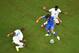 Costa Rican defenders smother Pirlo on the ball.