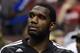 Jan 17, 2014; Philadelphia, PA, USA; Miami Heat center Greg Oden (20) watches from the bench during the first quarter against the Philadelphia 76ers at the Wells Fargo Center. The Heat defeated the Sixers 101-86. Mandatory Credit: Howard Smith-USA TODAY S