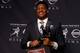 NEW YORK, NY - DECEMBER 14: Jameis Winston, quarterback of the Florida State Seminoles, poses with the trophy during a press conference after the 2013 Heisman Trophy Presentation at the Marriott Marquis on December 14, 2013 in New York City. (Photo by J