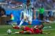 BELO HORIZONTE, BRAZIL - JUNE 21: Ashkan Dejagah of Iran tackles Lionel Messi of Argentina during the 2014 FIFA World Cup Brazil Group F match between Argentina and Iran at Estadio Mineirao on June 21, 2014 in Belo Horizonte, Brazil. (Photo by Quinn Roon