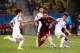 CUIABA, BRAZIL - JUNE 17: Victor Fayzulin of Russia controls the ball against Han Kook-Young (L) and Lee Yong of South Korea during the 2014 FIFA World Cup Brazil Group H match between Russia and South Korea at Arena Pantanal on June 17, 2014 in Cuiaba,