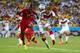 FORTALEZA, BRAZIL - JUNE 21: John Boye of Ghana and Bastian Schweinsteiger of Germany go up for a header during the 2014 FIFA World Cup Brazil Group G match between Germany and Ghana at Castelao on June 21, 2014 in Fortaleza, Brazil. (Photo by Michael S