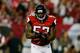 ATLANTA, GA - JANUARY 13: Akeem Dent #52 of the Atlanta Falcons celebrates stopping Marshawn Lynch #24 of the Seattle Seahawks in the first quarter of the NFC Divisional Playoff Game at Georgia Dome on January 13, 2013 in Atlanta, Georgia. (Photo by Ke