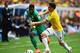 BRASILIA, BRAZIL - JUNE 19: Serge Aurier of the Ivory Coast and Santiago Arias of Colombia compete for the ball during the 2014 FIFA World Cup Brazil Group C match between Colombia and Cote D'Ivoire at Estadio Nacional on June 19, 2014 in Brasilia, Brazi