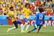 FORTALEZA, BRAZIL - JUNE 17: Paulinho of Brazil shoots against Guillermo Ochoa of Mexico as David Luiz runs on during the 2014 FIFA World Cup Brazil Group A match between Brazil and Mexico at Castelao on June 17, 2014 in Fortaleza, Brazil. (Photo by Lau
