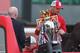 MANCHESTER, ENGLAND - MAY 13: Rio Ferdinand holds the Barclays Premier League trophy onboard the open topped bus outside Old Trafford as Wayne Rooney (C,L) looks down during the Manchester United Premier League winners parade on May 13, 2013 in Mancheste