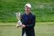 CROMWELL, CT - JUNE 22: Kevin Streelman of the United States holds the trophy after winning the Travelers Championship golf tournament at the TPC River Highlands on June 22, 2014 in Cromwell, Connecticut. (Photo by Jim Rogash/Getty Images)