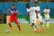 NATAL, BRAZIL - JUNE 16: Fabian Johnson of the United States controls the ball against Jonathan Mensah of Ghana during the 2014 FIFA World Cup Brazil Group G match between Ghana and the United States at Estadio das Dunas on June 16, 2014 in Natal, Brazil