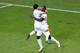L'VIV, UKRAINE - JUNE 13: Silvestre Varela of Portugal celebrates scoring their third goal with Joao Moutinho of Portugal during the UEFA EURO 2012 group B match between Denmark and Portugal at Arena Lviv on June 13, 2012 in L'viv, Ukraine. (Photo by Al