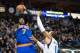 Jan 5, 2014; Dallas, TX, USA; New York Knicks small forward Carmelo Anthony (7) shoots over Dallas Mavericks small forward Shawn Marion (0) during the second half at the American Airlines Center. The Knicks defeated the Mavericks 92-80. Mandatory Credit: