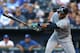 KANSAS CITY, MO - JUNE 20: Robinson Cano #22 of the Seattle Mariners hits a RBI single in the first inning against the Kansas City Royals at Kauffman Stadium on June 20, 2014 in Kansas City, Missouri. (Photo by Ed Zurga/Getty Images)