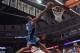 CHICAGO, IL - DECEMBER 16: Arron Afflalo #4 of the Orlando Magic puts up a shot against Carlos Boozer #5 of the Chicago Bulls at the United Center on December 16, 2013 in Chicago, Illinois. NOTE TO USER: User expressly acknowledges and agrees that, by do