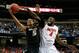 ATLANTA, GA - MARCH 14: Patric Young #4 of the Florida Gators defends against Jordan Clarkson #5 of the Missouri Tigers during the quarterfinals of the SEC Men's Basketball Tournament at Georgia Dome on March 14, 2014 in Atlanta, Georgia. (Photo by Kevi