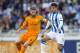 SAN SEBASTIAN, SPAIN - APRIL 05: Sergio Ramos of Real Madrid CF duels for the ball with Carlos Vela of Real Sociedad during the La Liga match between Real Sociedad and Real Madrid CF at Estadio Anoeta on April 5, 2014 in San Sebastian, Spain. (Photo by