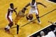 May 24, 2014; Miami, FL, USA; Indiana Pacers guard George Hill (3) guarded by Miami Heat guard Norris Cole (30) and forward Udonis Haslem (40) in game three of the Eastern Conference Finals of the 2014 NBA Playoffs at American Airlines Arena. Mandatory Cr