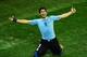 SAO PAULO, BRAZIL - JUNE 19: Luis Suarez of Uruguay celebrates after scoring his team's second goal during the 2014 FIFA World Cup Brazil Group D match between Uruguay and England at Arena de Sao Paulo on June 19, 2014 in Sao Paulo, Brazil. (Photo by Ma