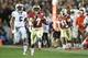 Jan 6, 2014; Pasadena, CA, USA; Florida State Seminoles wide receiver Kermit Whitfield (7) runs a touchdown past Auburn Tigers wide receiver Ricardo Louis (5) during the second half of the 2014 BCS National Championship game at the Rose Bowl. Mandatory C
