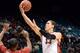 LAS VEGAS, NV - MARCH 12: Dwight Powell #33 of the Stanford Cardinal drives to the basket against Royce Woolridge #22 of the Washington State Cougars during a first-round game of the Pac-12 Basketball Tournament at the MGM Grand Garden Arena on March 12,