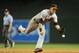 PHOENIX, AZ - JUNE 22: Infielder Joe Panik #12 of the San Francisco Giants flips the ball to first base for a ground ball out against the Arizona Diamondbacks during the fifth inning of the MLB game at Chase Field on June 22, 2014 in Phoenix, Arizona. (