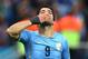 SAO PAULO, BRAZIL - JUNE 19: Luis Suarez of Uruguay gestures during the 2014 FIFA World Cup Brazil Group D match between Uruguay and England at Arena de Sao Paulo on June 19, 2014 in Sao Paulo, Brazil. (Photo by Julian Finney/Getty Images)
