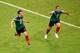 RECIFE, BRAZIL - JUNE 23: Javier Hernandez of Mexico (R) celebrates scoring his team's third goal during the 2014 FIFA World Cup Brazil Group A match between Croatia and Mexico at Arena Pernambuco on June 23, 2014 in Recife, Brazil. (Photo by Laurence G