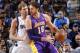 DALLAS, TX - JANUARY 7: Pau Gasol #16 of the Los Angeles Lakers controls the ball against Dirk Nowitzki #41 of the Dallas Mavericks on January 7, 2014 at the American Airlines Center in Dallas, Texas. NOTE TO USER: User expressly acknowledges and agrees t
