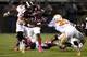 STARKVILLE, MS - OCTOBER 13: Running back LaDarius Perkins #27 of the Mississippi State Bulldogs gets around defensive back LaDarrell McNeil #33 of the Tennessee Volunteers for a big first down run on October 13, 2012 at Davis Wade Stadium in Starkville,