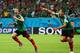 RECIFE, BRAZIL - JUNE 23: Andres Guardado (L) and Javier Hernandez of Mexico celebrate their team's second goal during the 2014 FIFA World Cup Brazil Group A match between Croatia and Mexico at Arena Pernambuco on June 23, 2014 in Recife, Brazil. (Pho