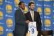 July 11, 2013; Oakland, CA, USA; Andre Iguodala (left) poses for a photo with Golden State Warriors general manager Bob Myers (right) in a press conference after a sign-and-trade deal for Iguodala to become a Golden State Warriors player at the Warriors P