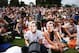 LONDON, ENGLAND - JUNE 23: Fans of Andy Murray gather on 'Murray Mount' to watch the Gentlemen's Singles first round match between Andy Murray of Great Britain and David Goffin of Belgium on day one of the Wimbledon Lawn Tennis Championships at the All E