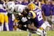 LSU cornerback Rashard Robinson (right) makes a tackle against Furman