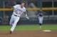 Omaha, NE - JUNE 23: Center fielder Brandon Downs #10 of the Virginia Cavaliers triples against the Vanderbilt Commodores in the fifth inning during game one of the College World Series Championship on June 23, 2014 at TD Ameritrade Park in Omaha, Nebrask