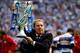 LONDON, ENGLAND - MAY 24: QPR manager Harry Redknapp celebrates with the trophy after the Sky Bet Championship Playoff Final match between Derby County and Queens Park Rangers at Wembley Stadium on May 24, 2014 in London, England. (Photo by Ben Hoskins/