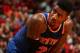 MIAMI, FL - April 6: Iman Shumpert #21 of the New York Knicks looks on during the game against the Miami Heat at the American Airlines Arena in Miami, Florida on April 6, 2014. NOTE TO USER: User expressly acknowledges and agrees that, by downloading and/