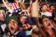 RIO DE JANEIRO, BRAZIL - JUNE 22: American fans celebrate after the U.S. scored to take a 2-1 lead over Portugal while watching a video broadcast at the FIFA Fan Fest on Copacabana Beach during the 2014 FIFA World Cup Brazil on June 22, 2014 in Rio de Ja