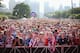 CHICAGO, IL - JUNE 22: Fans gather in Grant Park to watch the U.S. play Portugal in a Group G World Cup soccer match on June 22, 2014 in Chicago, Illinois. Fans were turned away from the free event after a 10,000-person capacity was reached. (Photo by S