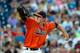 Jun 17, 2014; Omaha, NE, USA; Virginia Cavaliers pitcher Brandon Waddell (20) pitches against the TCU Horned Frogs during game eight of the 2014 College World Series at TD Ameritrade Park Omaha. Virginia defeated TCU 3-2 in 15 innings. Mandatory Credit: S