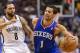 Apr 5, 2014; Philadelphia, PA, USA; Philadelphia 76ers guard Michael Carter-Williams (1) is defended by Brooklyn Nets guard Deron Williams (8) during the first quarter at the Wells Fargo Center. Mandatory Credit: Howard Smith-USA TODAY Sports