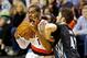 Jan 25, 2014; Portland, OR, USA; Portland Trail Blazers power forward LaMarcus Aldridge (12) drives to the basket against Minnesota Timberwolves power forward Kevin Love (42) during the first quarter at the Moda Center. Mandatory Credit: Craig Mitchelldye