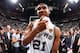 SAN ANTONIO, TX - JUNE 15: Tim Duncan #21 of the San Antonio Spurs react after winning the 2014 NBA Finals at AT&T Center on June 15, 2014 in San Antonio, Texas. NOTE TO USER: User expressly acknowledges and agrees that, by downloading and/or using this p