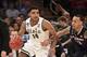 Mar 30, 2014; New York, NY, USA; Michigan State Spartans guard Gary Harris (14) handles the ball against Connecticut Huskies guard Shabazz Napier (13) during the second half in the finals of the east regional of the 2014 NCAA Mens Basketball Championship